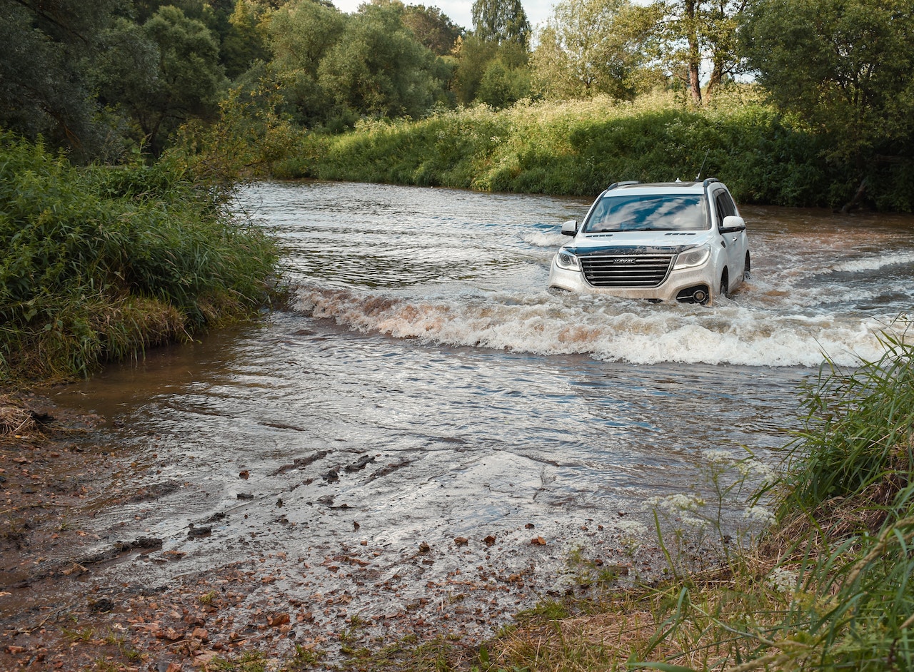A Vehicle going across a River